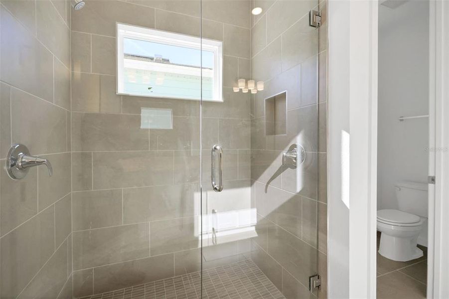 Furnished interior view inside a new home in Serenade at Ovation, Winter Garden (Image 9).