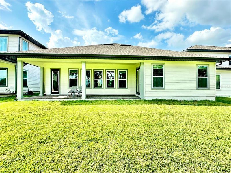 Exterior details and patio area of a home in Northlake Traditional, Winter Garden (Image 28). Exterior details and patio area of a home in Northlake Traditional, Winter Garden (Image 28).