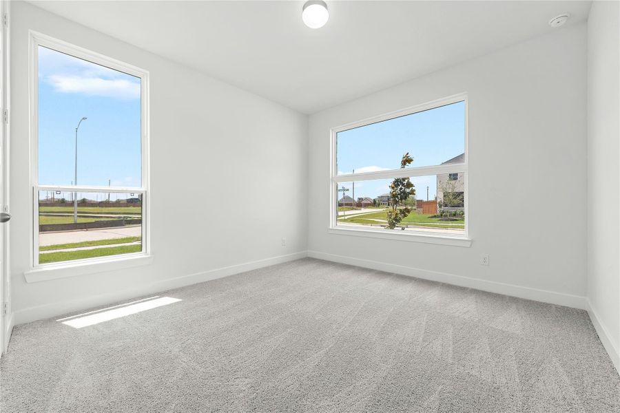 Spacious, unfurnished interior of a new home in Sunterra, Katy (Image 13).