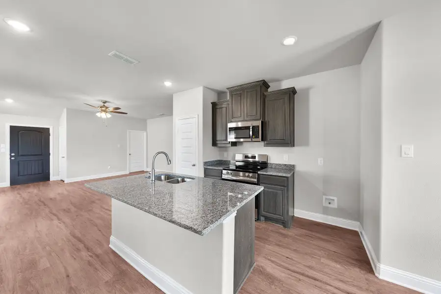 Furnished interior view inside a new home in Stonecreek, Sulphur Springs (Image 7).