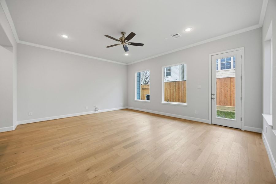 Sunshine, Space & Seamless Flow Oversized windows line the back wall, filling your home with natural light and offering a welcoming view to the private, fenced backyard. Sunshine, Space & Seamless Flow Oversized windows line the back wall, filling your home with natural light and offering a welcoming view to the private, fenced backyard.