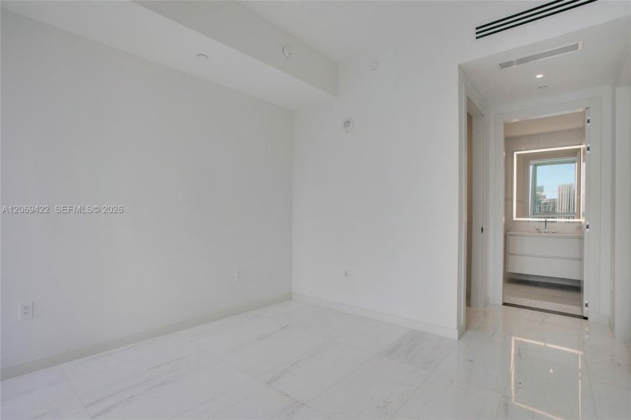 Spacious, unfurnished interior of a new home in Aston Martin Residences, Miami (Image 15). Spacious, unfurnished interior of a new home in Aston Martin Residences, Miami (Image 15).