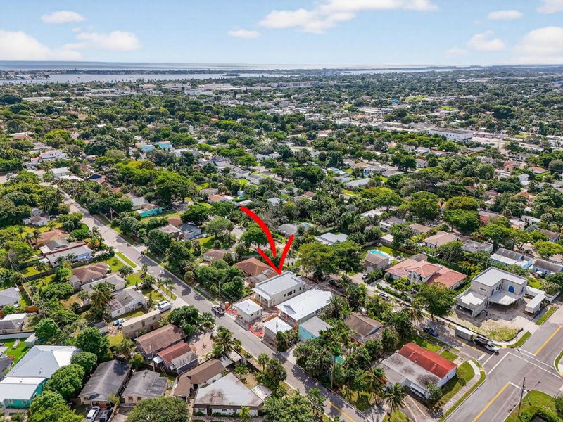 Front exterior of a new home in , West Palm Beach, FL, highlighting curb appeal (Image 10). Front exterior of a new home in , West Palm Beach, FL, highlighting curb appeal (Image 10).