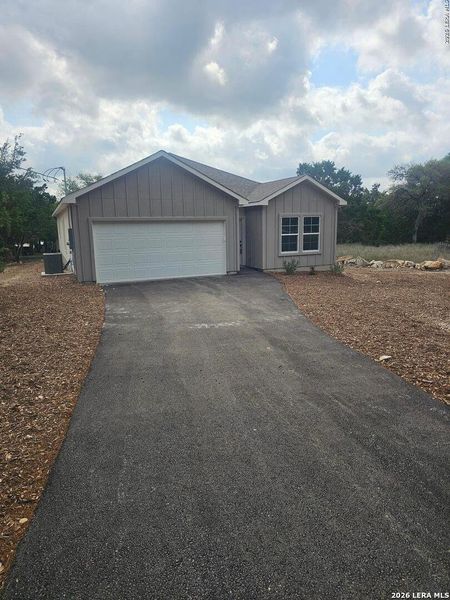 Front exterior of a new home in , Spring Branch, TX, highlighting curb appeal (Image 11).