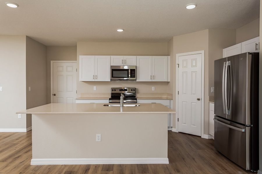 Furnished interior view inside a new home in Scenic Terrace, Haines City (Image 3).