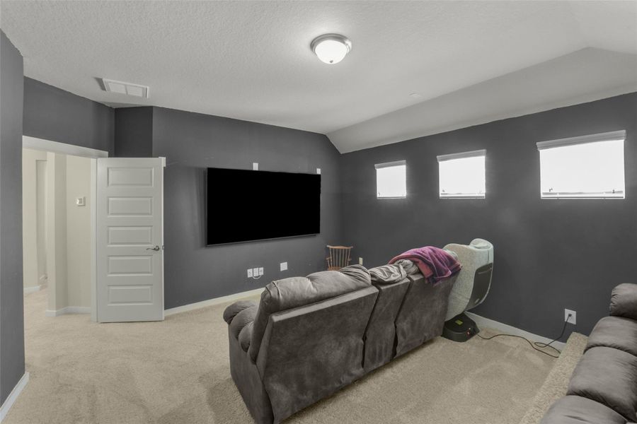 Spacious media room ready for movie nights.