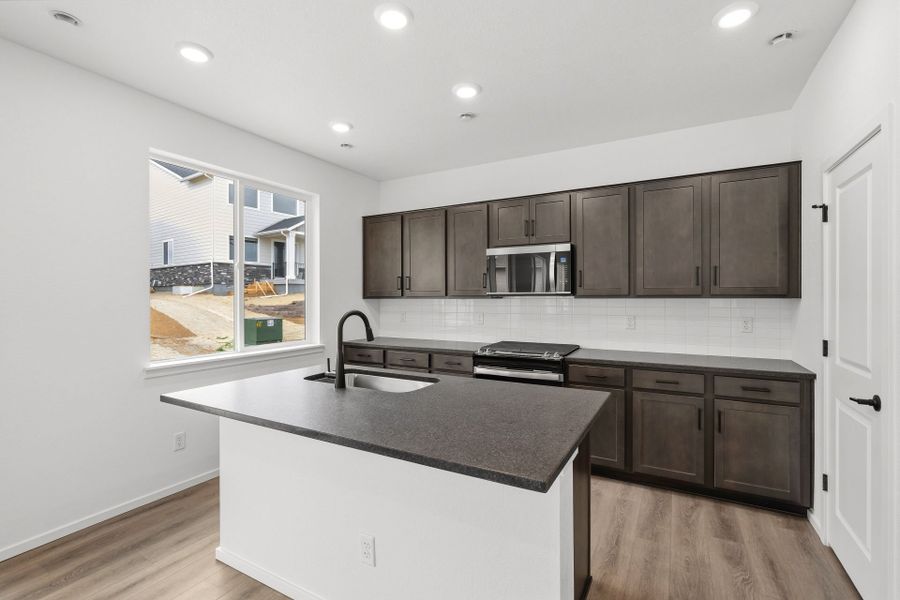 Furnished interior view inside a new home in Harvest Crossing, Aurora (Image 11).