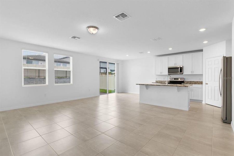 Spacious, unfurnished interior of a new home in Lawson Dunes - Signature Series, Haines City (Image 26).