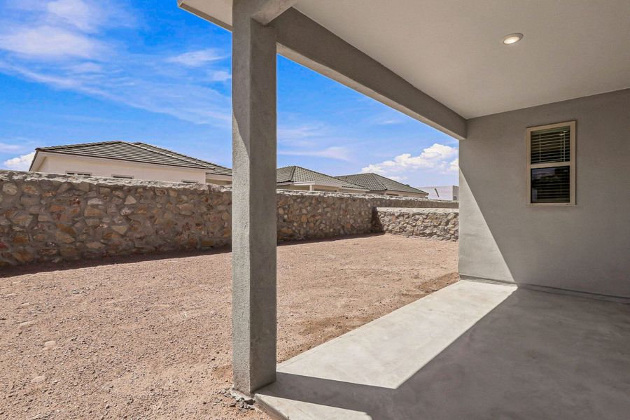 Exterior details and patio area of a home in Paseos Del Este, El Paso (Image 4).