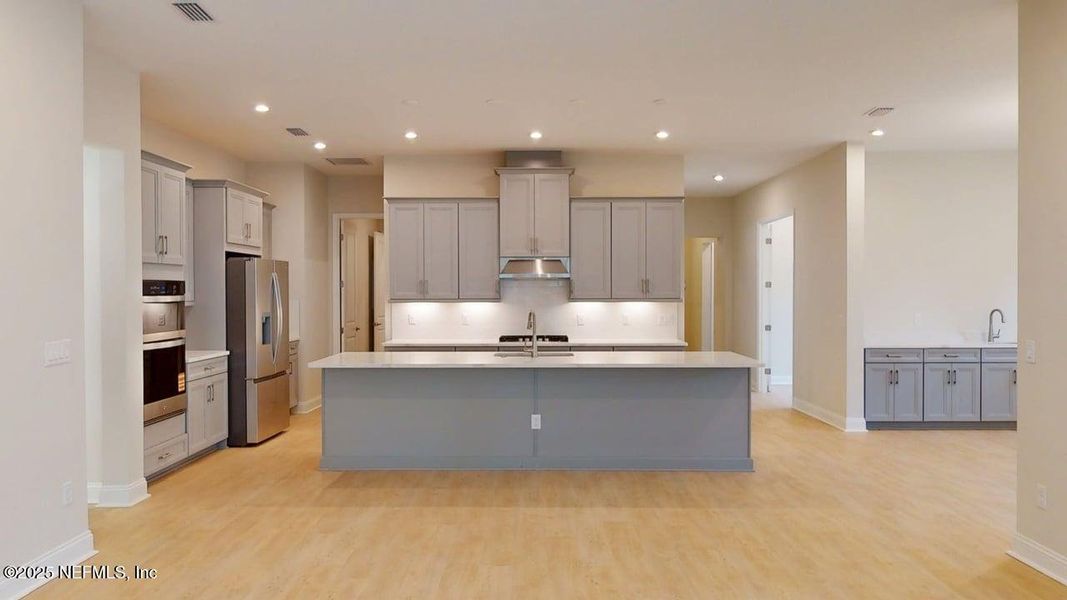 Furnished interior view inside a new home in RiverTown - WaterSong, St. Johns (Image 5).