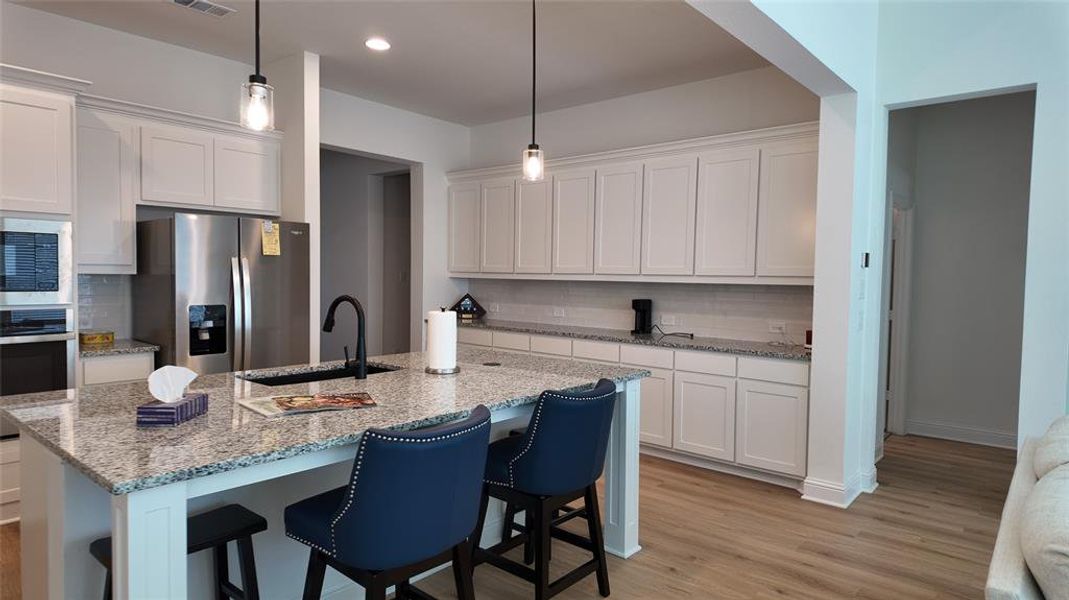 Furnished interior view inside a new home in Panchasarp Farms, Burleson (Image 16). Furnished interior view inside a new home in Panchasarp Farms, Burleson (Image 16).