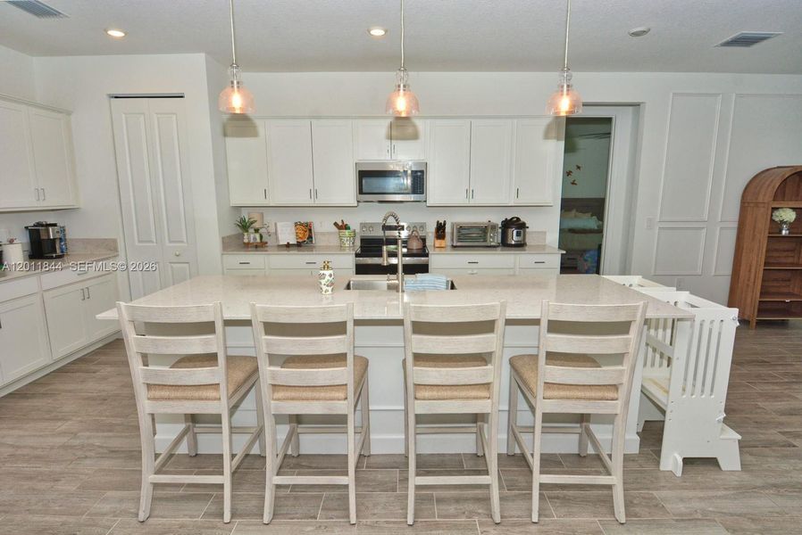 Furnished interior view inside a new home in Central Park, Port St. Lucie (Image 46).