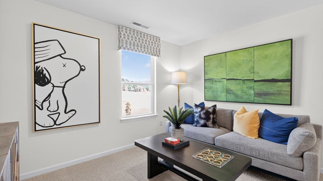 Representative furnished interior of a home built from the Penwell by D.R. Horton in Mangum Farms, Stem (Image 10).