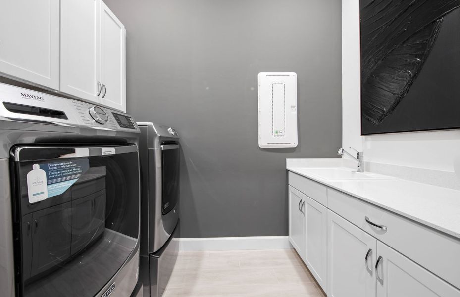 Laundry Room with Cabinets for Extra Storage