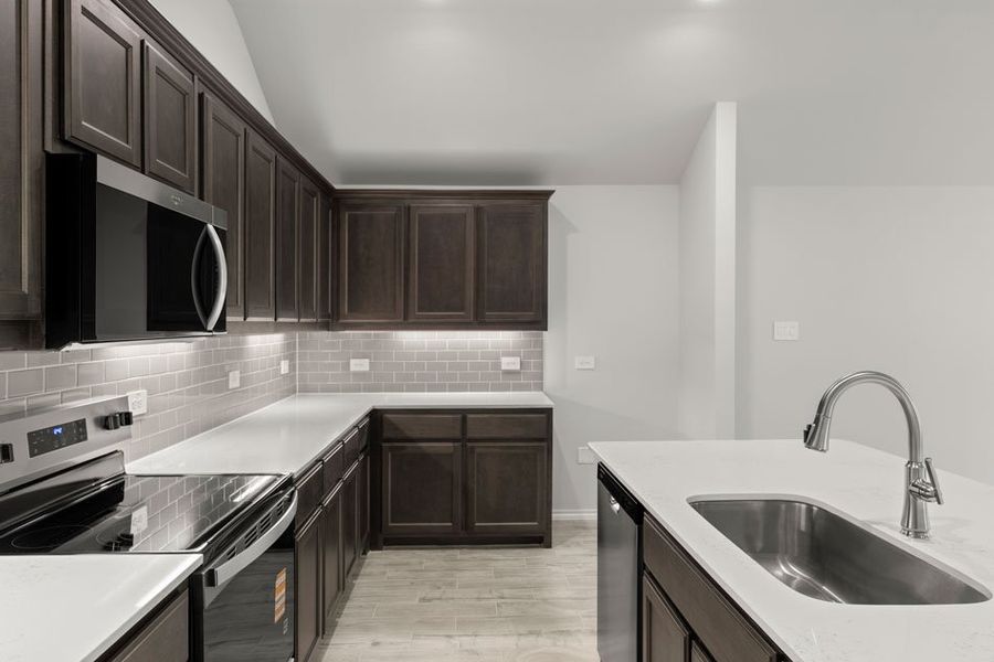 Representative exterior photo of a completed home built from the Boston by Impression Homes in Keeneland, Aubrey, TX (Image 6).