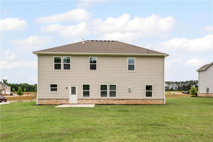 Front exterior of a new home in Anderson Point Estates, McDonough, GA, highlighting curb appeal (Image 16).
