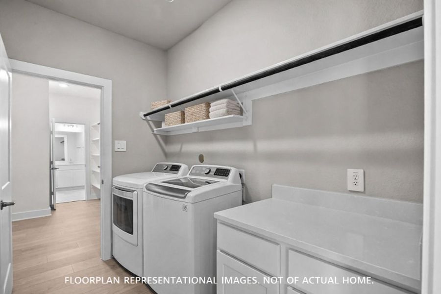 Furnished interior view inside a new home in Sorella, Tomball (Image 14).