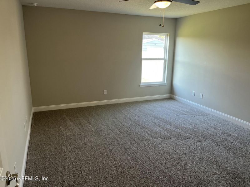 Spacious, unfurnished interior of a new home in , Green Cove Springs (Image 9).