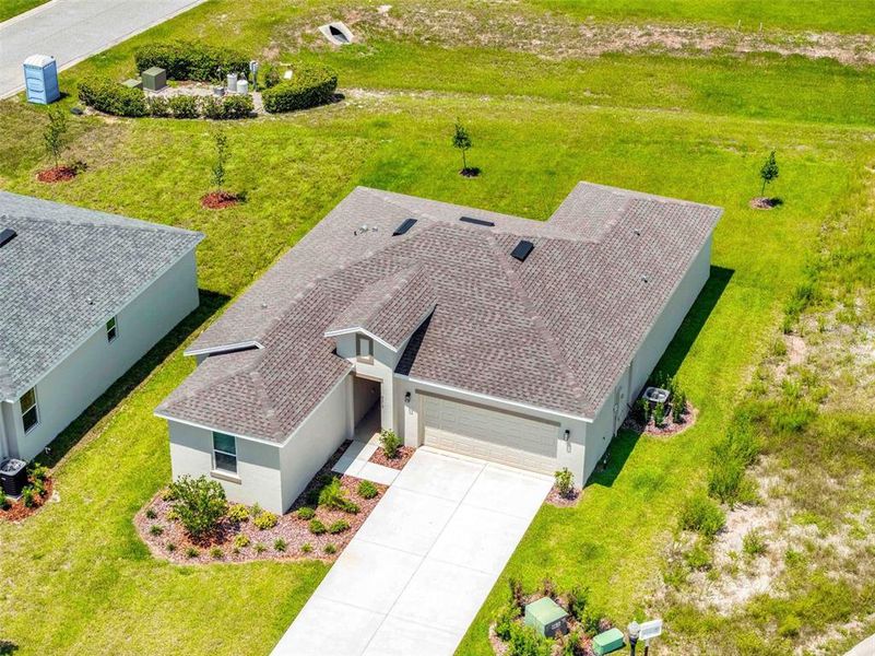 Front exterior of a new home in , Weeki Wachee, FL, highlighting curb appeal (Image 23).