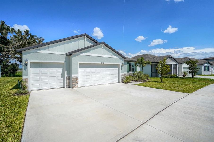Front exterior of a new home in , Bartow, FL, highlighting curb appeal (Image 2). Front exterior of a new home in , Bartow, FL, highlighting curb appeal (Image 2).
