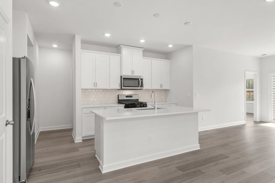 Furnished interior view inside a new home in Cypress Ridge - The Boardwalk Series, Longs (Image 5).