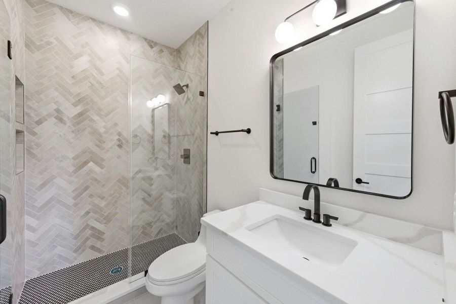 Bathroom with designer tile Bathroom with designer tile