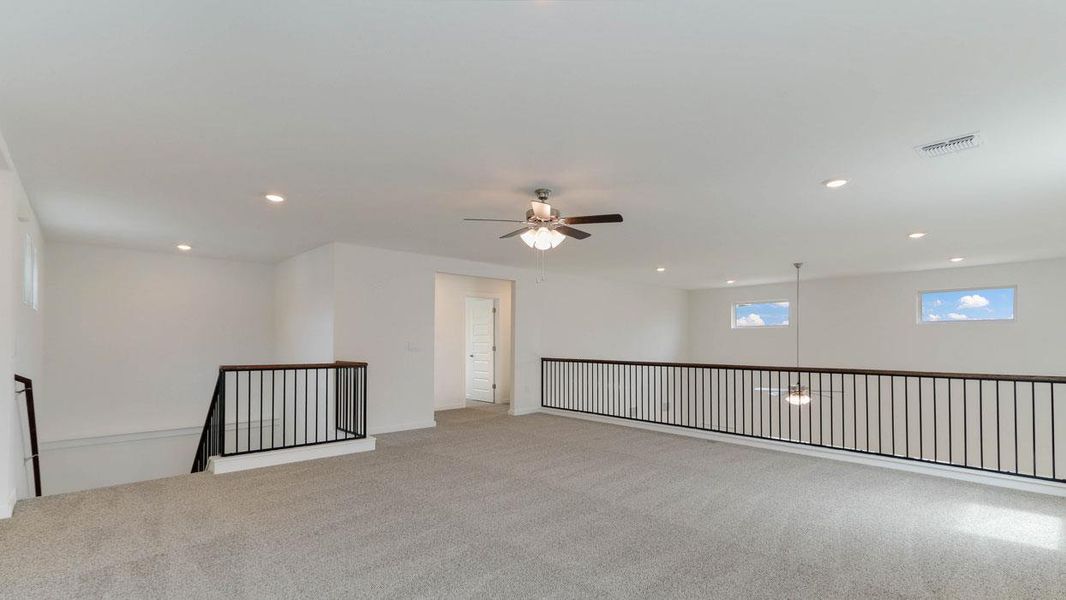 Spacious, unfurnished interior of a new home in Rosenbusch Ranch, Leander (Image 9).