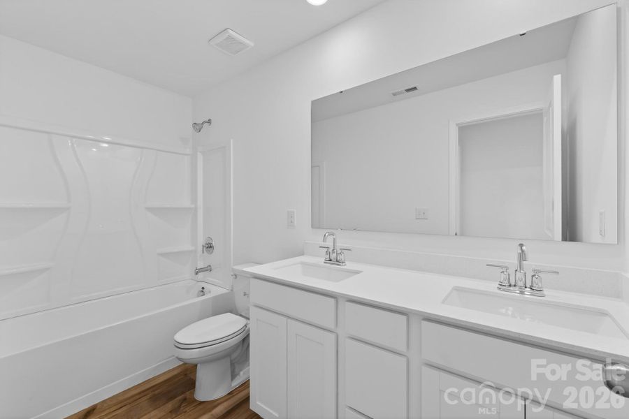 Furnished interior view inside a new home in Creekside Cottages, Bessemer City (Image 6).