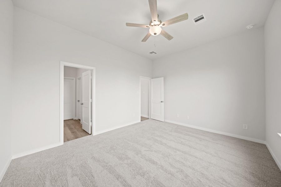 Spacious, unfurnished interior of a new home in Creekland Village at Bridgeland, Cypress (Image 19).