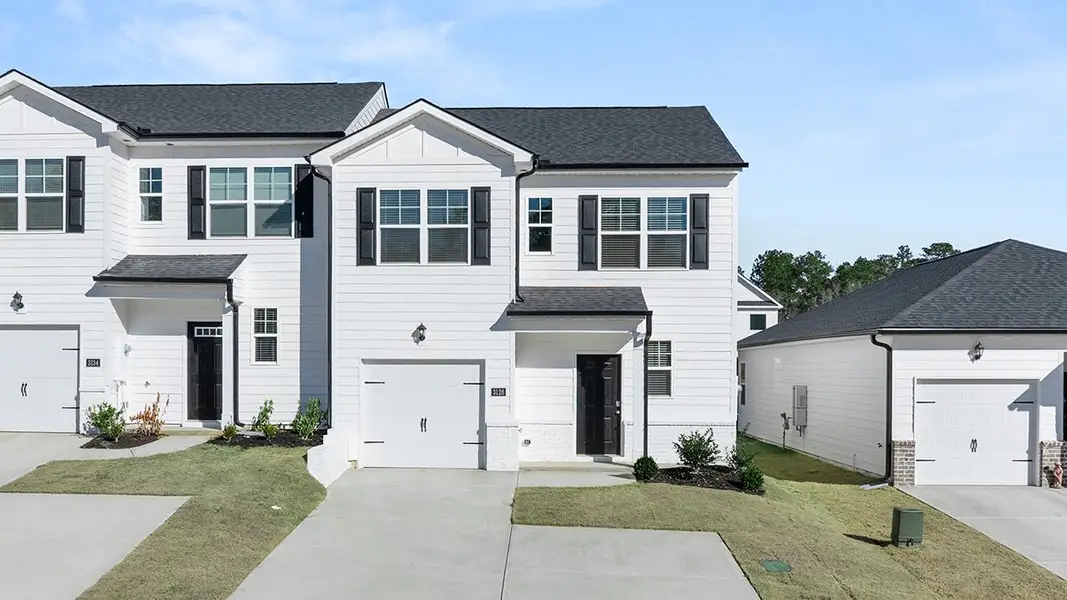 Front exterior of a new home in Byrd Village, Graniteville, SC, highlighting curb appeal (Image 1). Front exterior of a new home in Byrd Village, Graniteville, SC, highlighting curb appeal (Image 1).