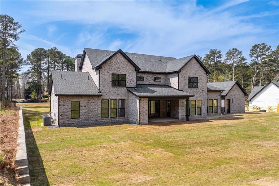Front exterior of a new home in , Monroe, GA, highlighting curb appeal (Image 30). Front exterior of a new home in , Monroe, GA, highlighting curb appeal (Image 30).