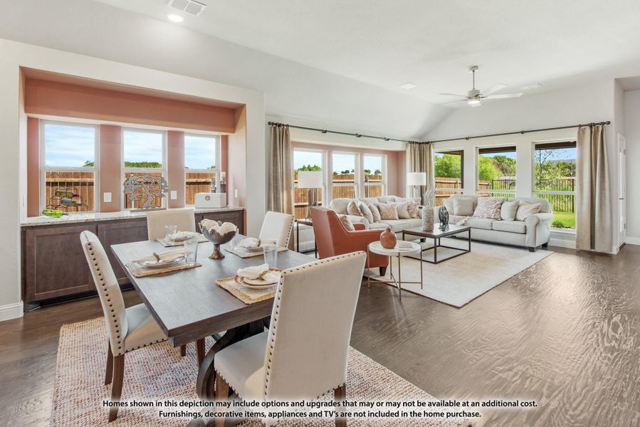 Open-plan dining and living area with dark wood floors, vaulted ceiling, and large windows Open-plan dining and living area with dark wood floors, vaulted ceiling, and large windows
