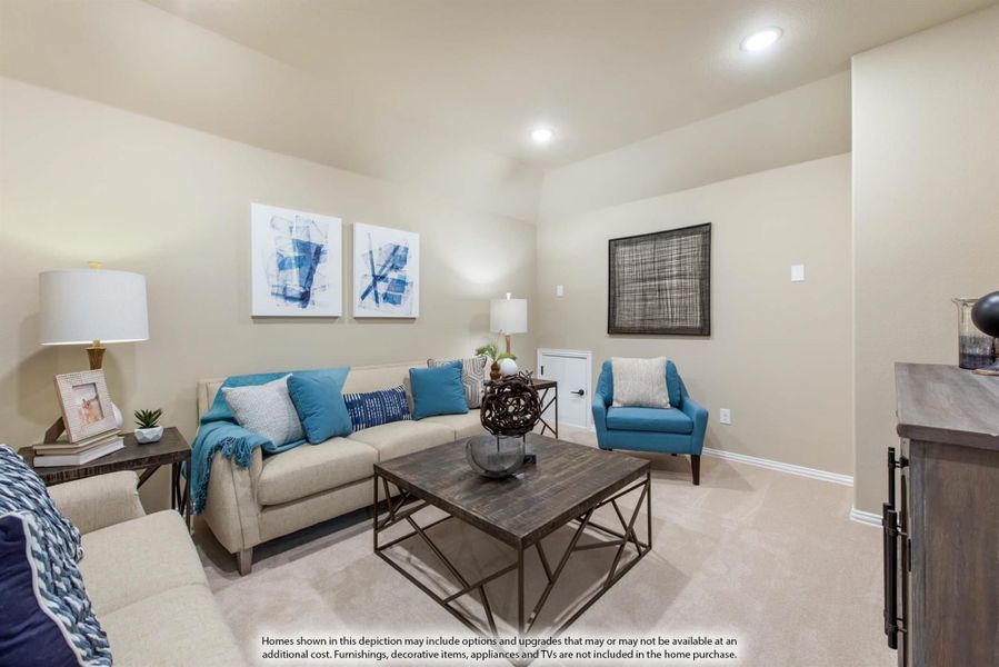 Living room with beige sofa, teal accent pillows, wood coffee table, and light carpet