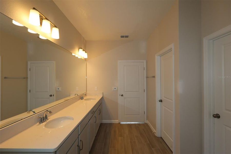 Furnished interior view inside a new home in Center Lake on the Park, St. Cloud (Image 2). Furnished interior view inside a new home in Center Lake on the Park, St. Cloud (Image 2).