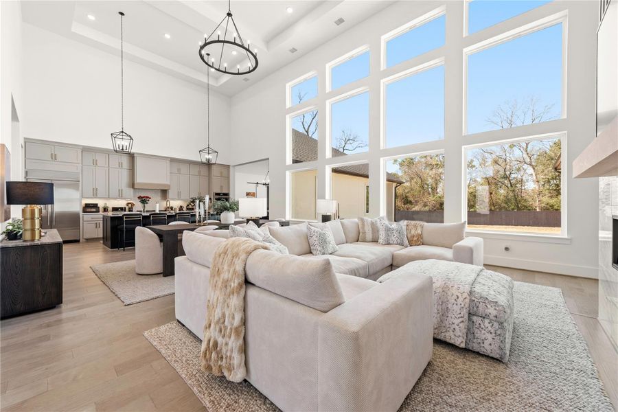 Sweeping windows provide a natural frame for future backyard oasis.