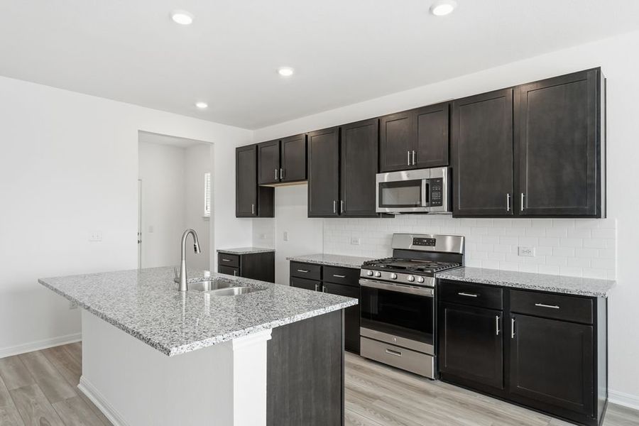 Furnished interior view inside a new home in Longview, Del Valle (Image 6).