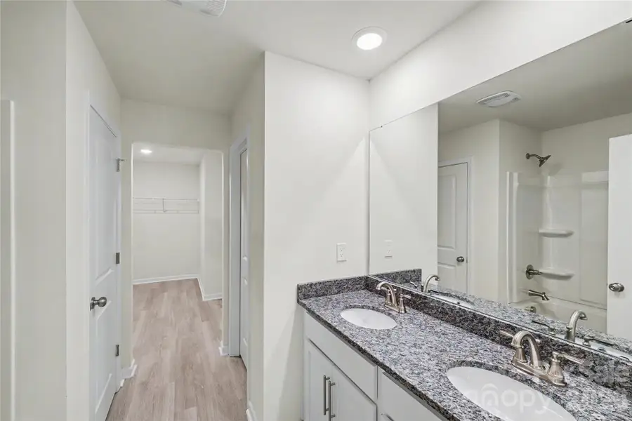 Furnished interior view inside a new home in , Iron Station (Image 9).