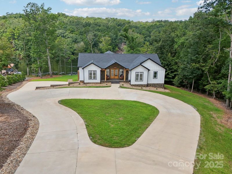 Front exterior of a new home in , New London, NC, highlighting curb appeal (Image 2). Front exterior of a new home in , New London, NC, highlighting curb appeal (Image 2).