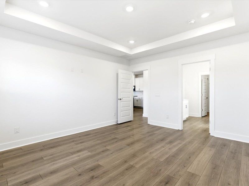 Spacious, unfurnished interior of a new home in The Coves at Lakes of Cane Bay, Summerville (Image 43). Spacious, unfurnished interior of a new home in The Coves at Lakes of Cane Bay, Summerville (Image 43).
