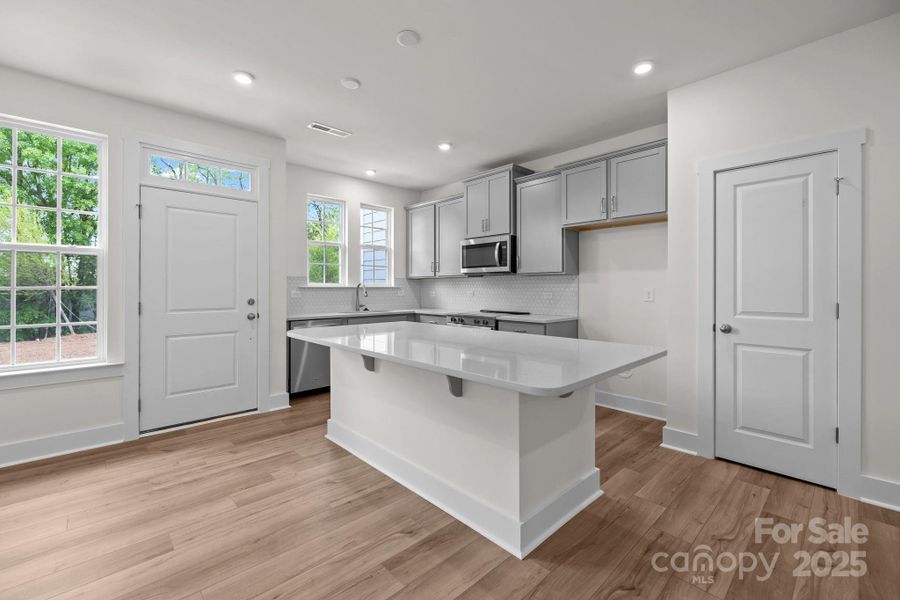 Furnished interior view inside a new home in Greenway Overlook, Charlotte (Image 11). Furnished interior view inside a new home in Greenway Overlook, Charlotte (Image 11).