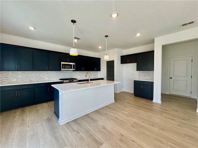 Furnished interior view inside a new home in Eastlyn Crossing, Flowery Branch (Image 9).