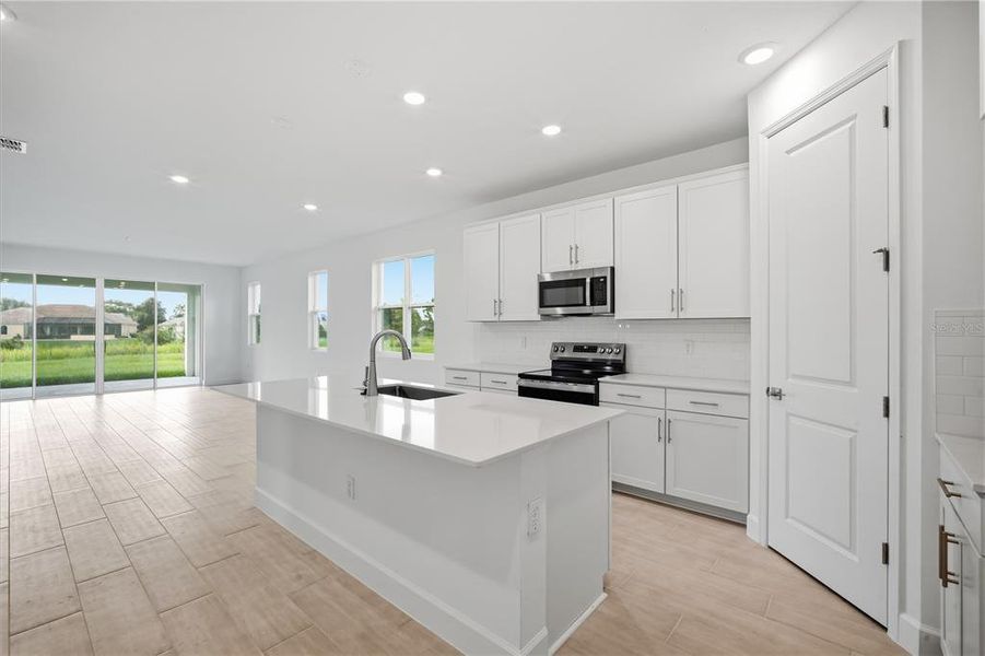 Furnished interior view inside a new home in Glen Lakes, Weeki Wachee (Image 13).