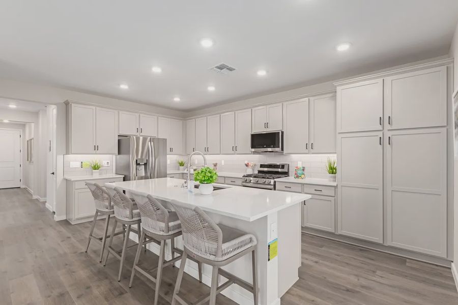 Representative furnished interior of a home built from the Granite Vista Avanti - Plan 2028 by Elliott Homes in Avanti at Granite Vista, Waddell (Image 10).