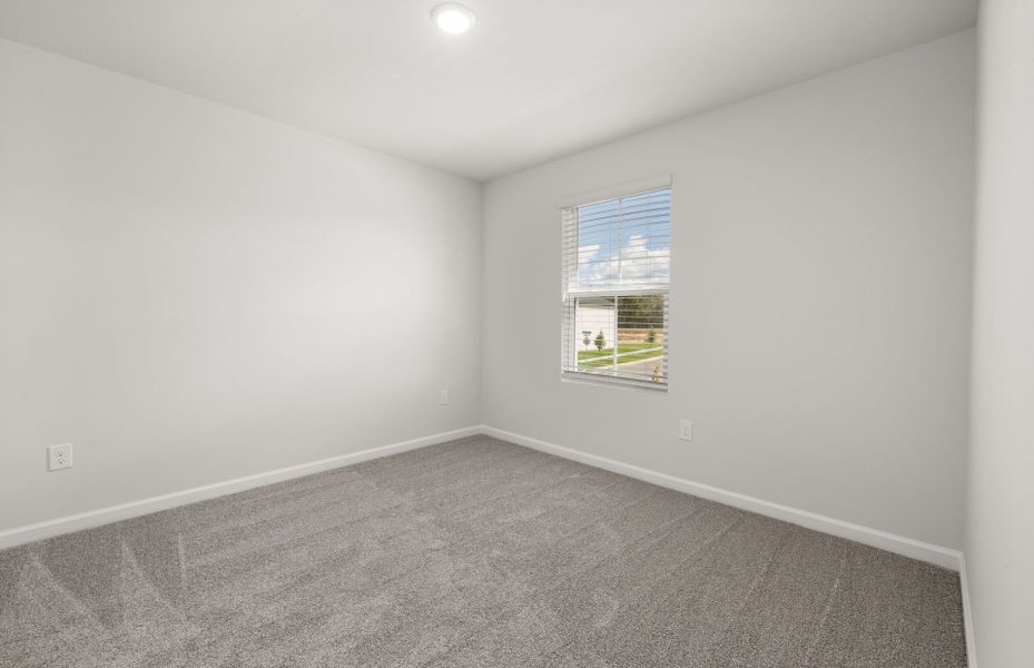 Spacious, unfurnished interior of a new home in Carpenter Falls, Durham (Image 24).