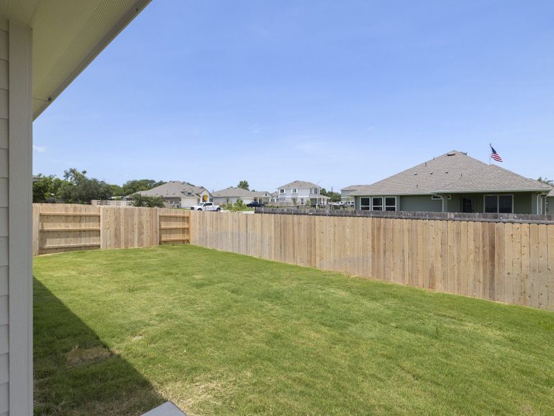 Exterior details and patio area of a home in Grande Estates, Bertram (Image 26).