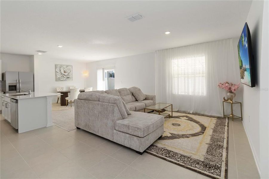 Furnished interior view inside a new home in Peace Creek Reserve: Manor Key Collection, Winter Haven (Image 8).