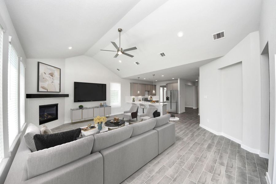 VS. Take another glimpse into the heart of the home with this additional view of the family room—a sprawling space ready to accommodate all your gatherings. Sample photo of completed home with similar floor plan. Actual colors and selections may vary. VS. Take another glimpse into the heart of the home with this additional view of the family room—a sprawling space ready to accommodate all your gatherings. Sample photo of completed home with similar floor plan. Actual colors and selections may vary.