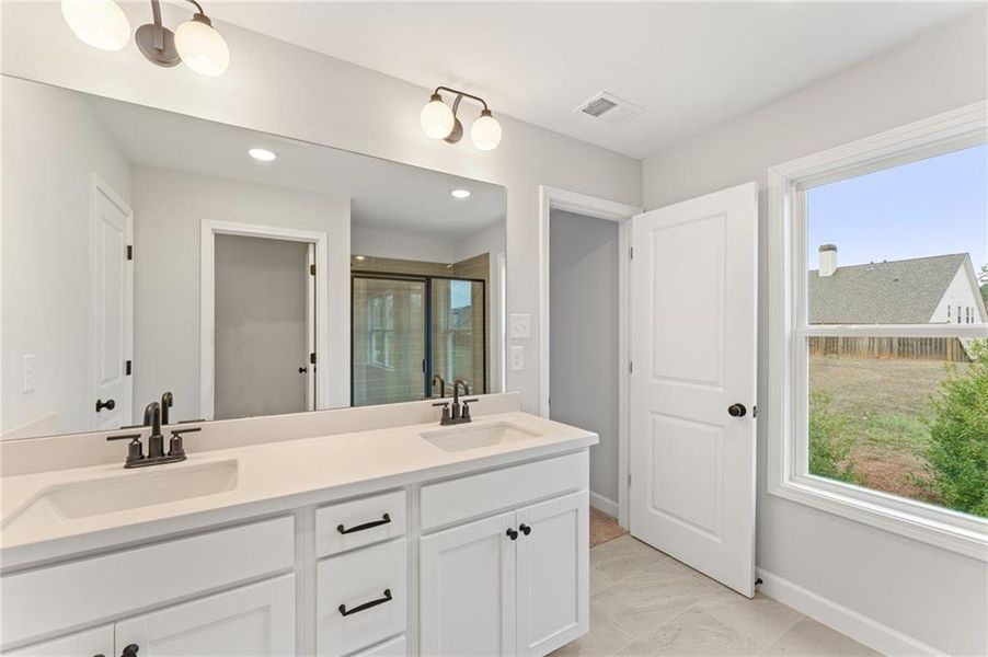 Furnished interior view inside a new home in Bluffs at Bells Ferry, Marietta (Image 10).