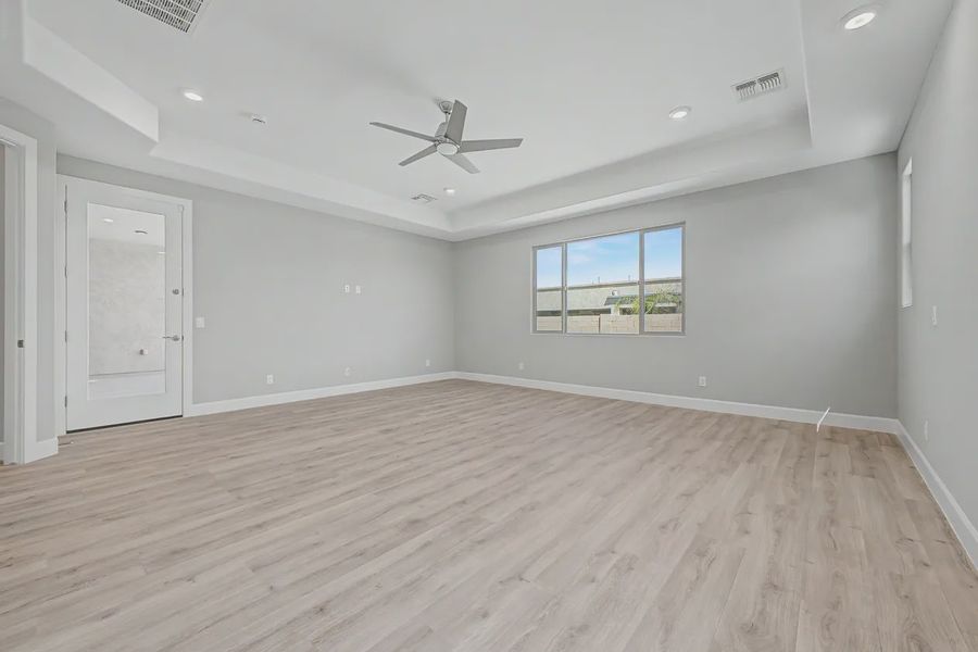 Spacious, unfurnished interior of a new home in Bellero Estates, Queen Creek (Image 27).