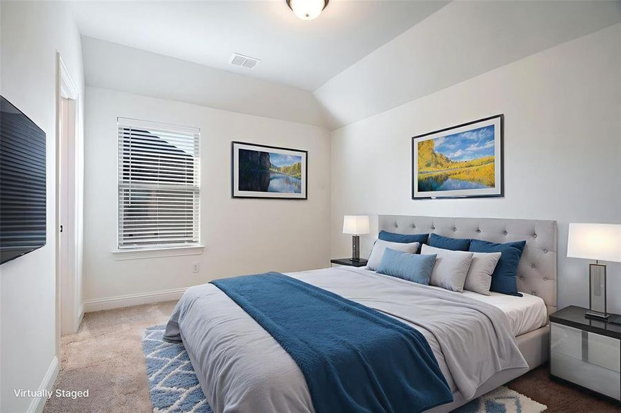 Another roomy bedroom upstairs offers plenty of space to stretch out and settle in.